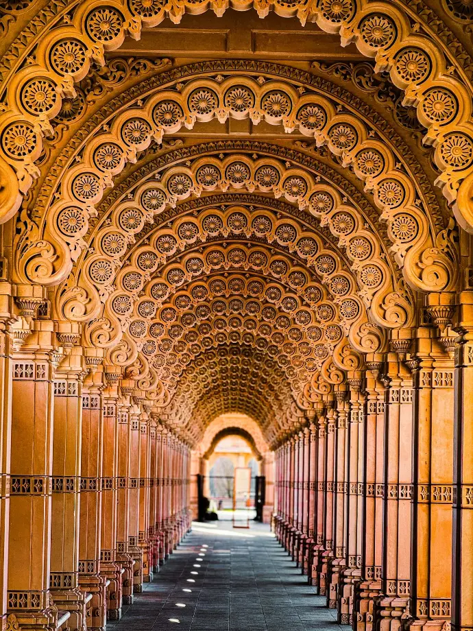Intricate architectural detail in a long corridor.